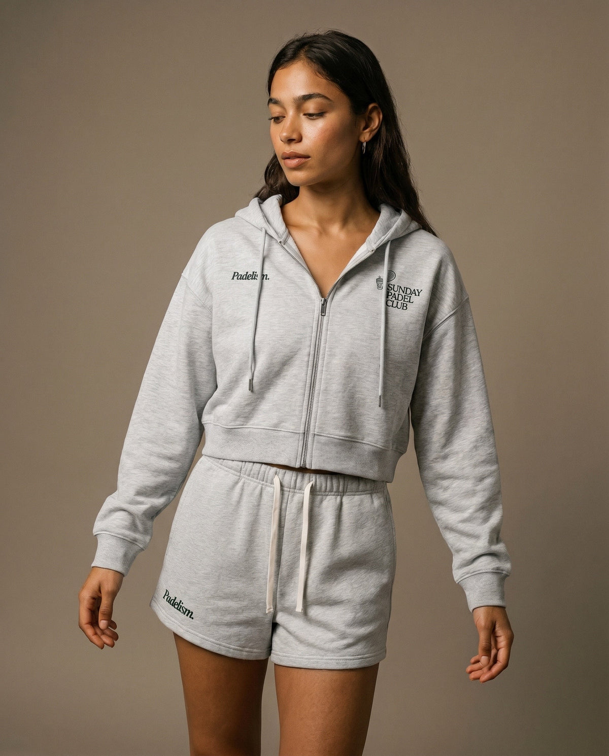 Light gray cropped zip-up hoodie and matching drawstring shorts set, side view