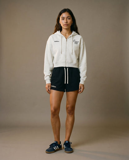 White cropped zip-up hoodie with black drawstring shorts set