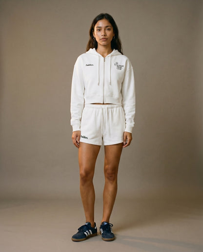 Cropped zip hoodie with hood, white fabric, front view with small chest graphics