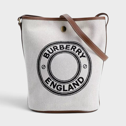 Medium bucket bag with Burberry England logo patch, beige canvas, brown leather trim