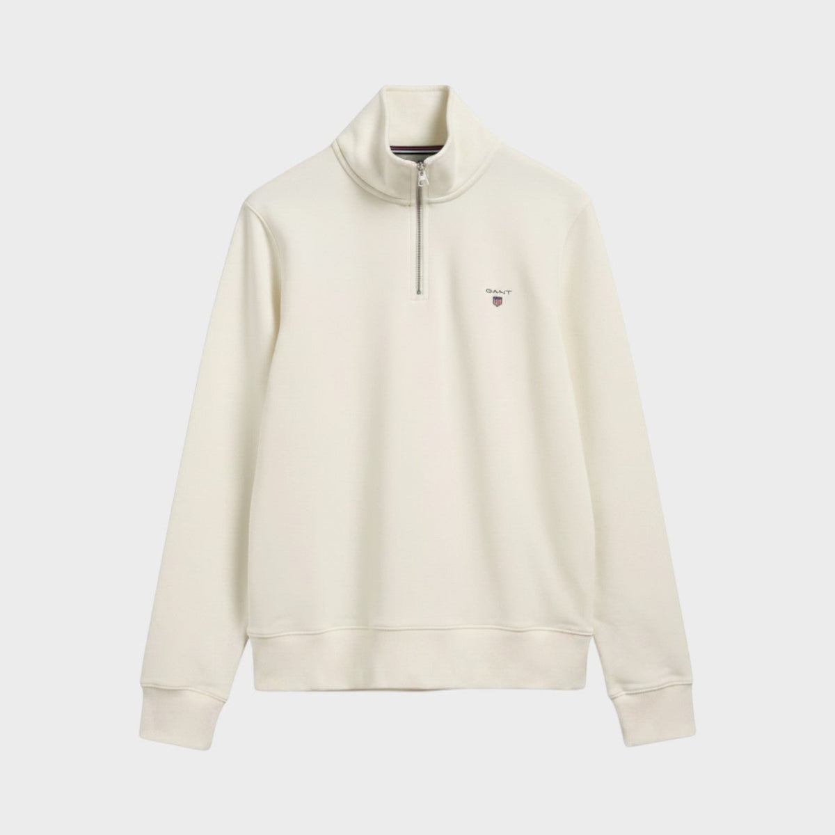 Cream half-zip sweater with stand collar and long sleeves