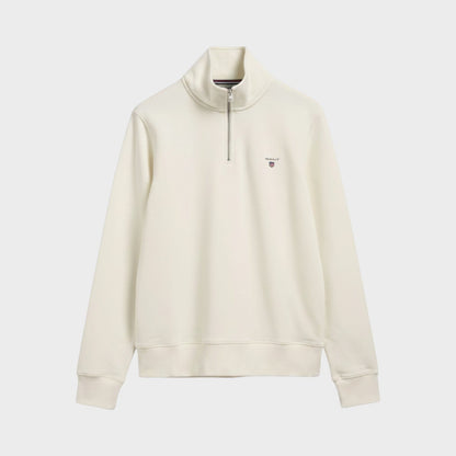 Cream half-zip sweater with stand collar and long sleeves