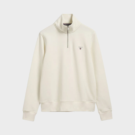 Cream half-zip sweater with stand collar and long sleeves