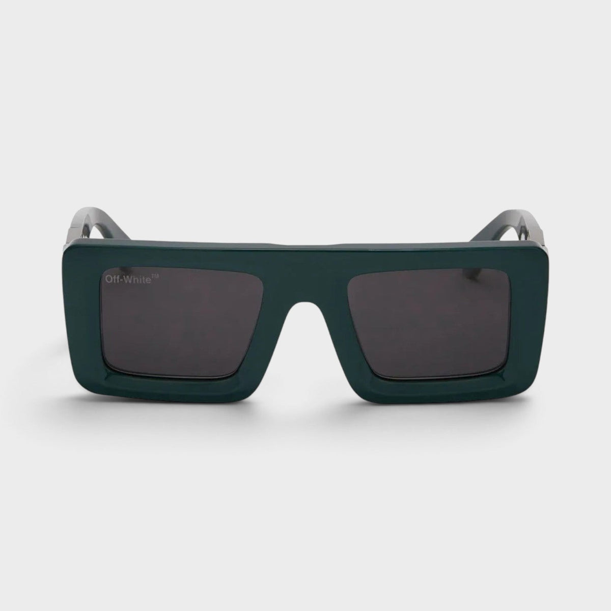 Green square-frame sunglasses with dark lenses and silver temple hardware