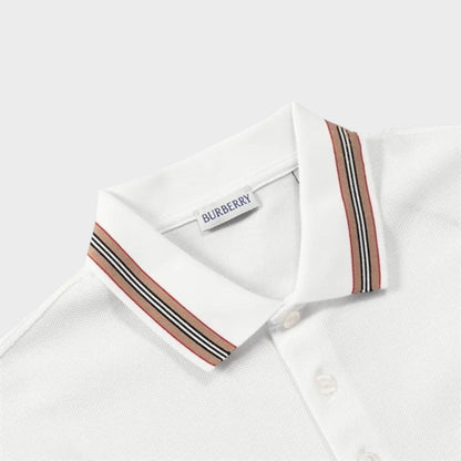 White polo neckline with multicolor striped collar facing and Burberry label.