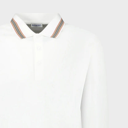 White long-sleeve polo collar with button and Burberry logo; multicolor striped trim.