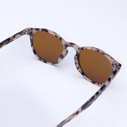 Leopard-print sunglasses side view with brown tinted lenses