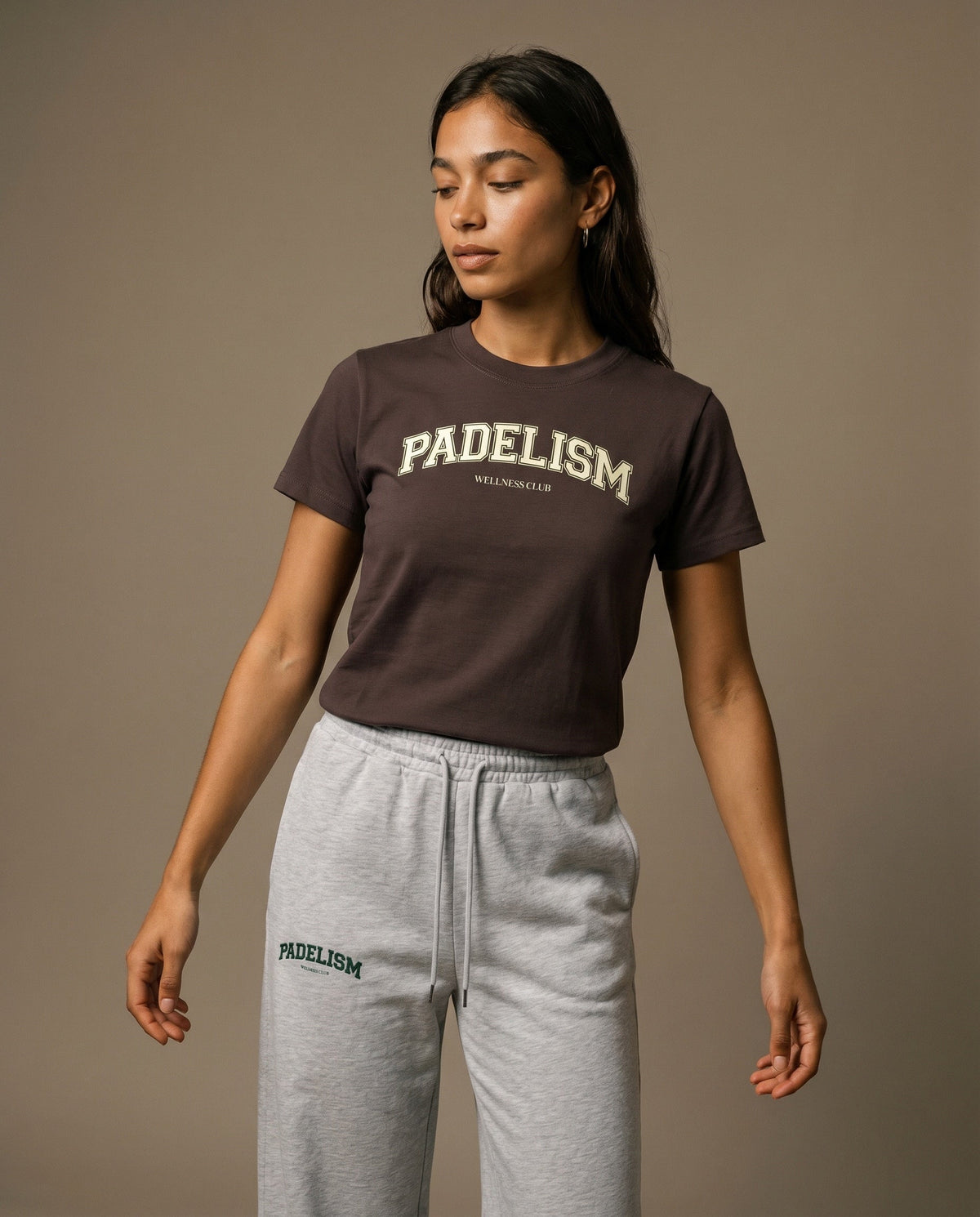 Brown crewneck t-shirt with front graphic print, short sleeves.