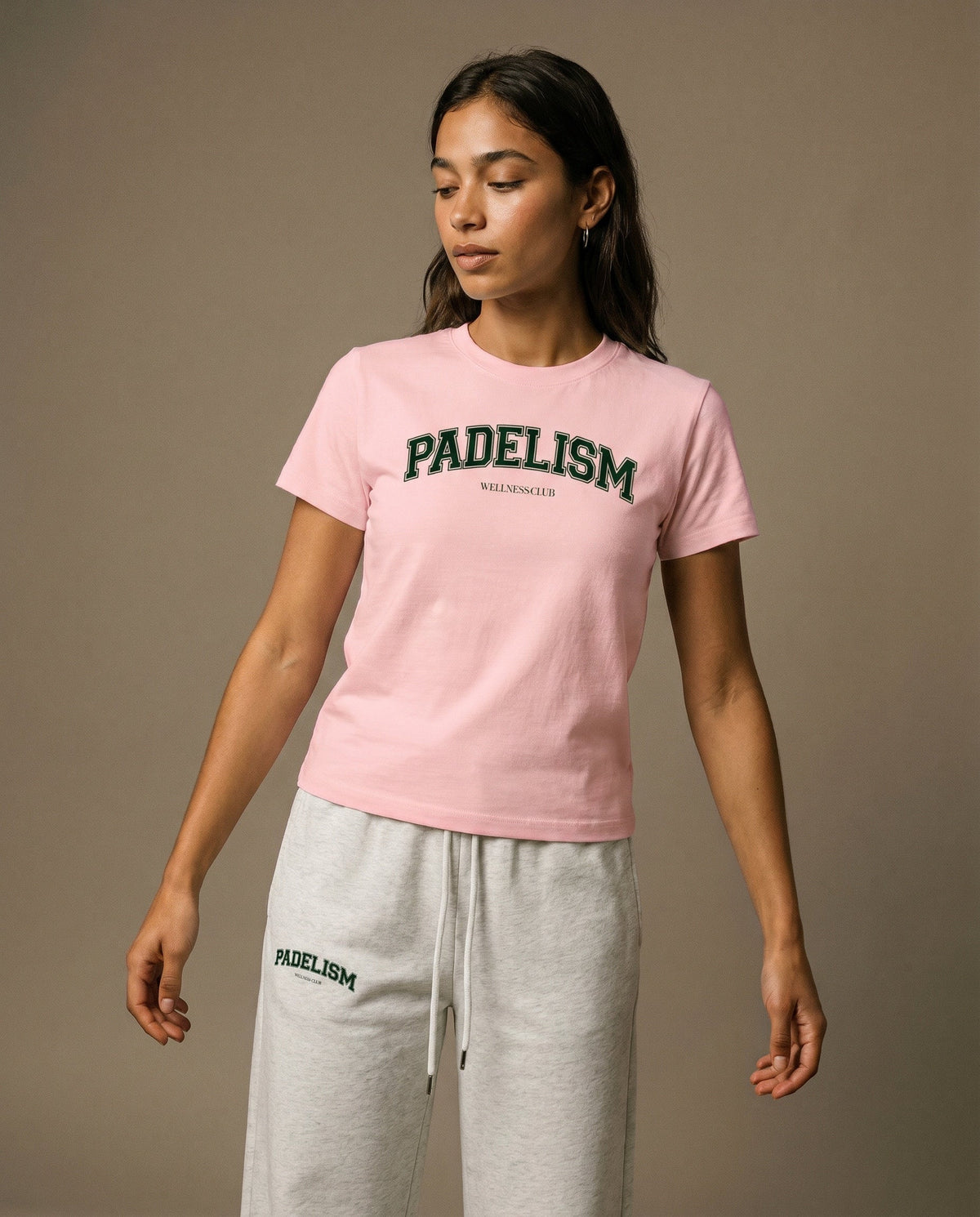 Pink crewneck t-shirt with front graphic print, short sleeves.