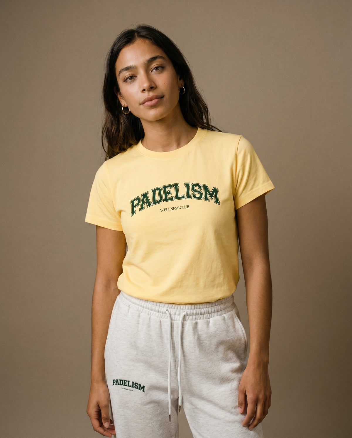 Yellow crewneck T-shirt with green Padelism logo on front