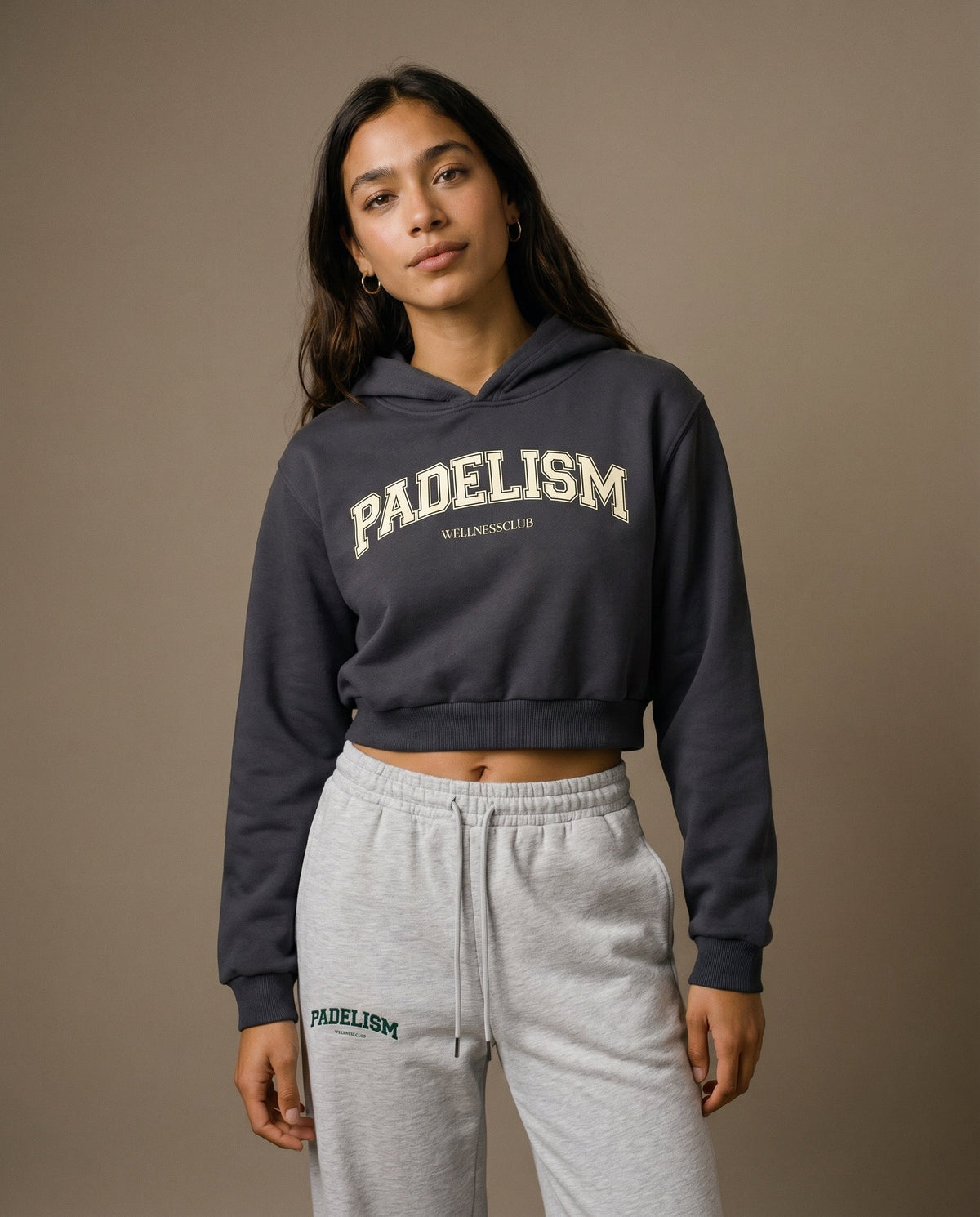 Charcoal gray cropped hoodie with hood and front Padelism Wellness Club logo print
