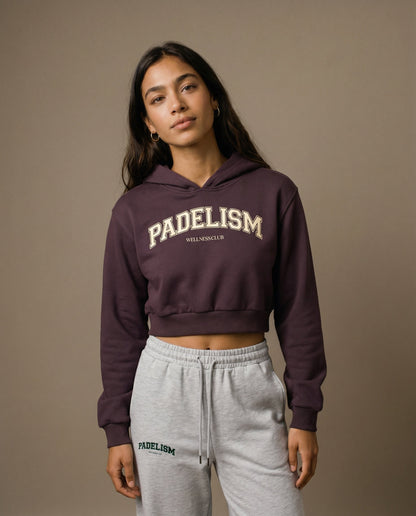 Cropped pullover hoodie in dark reddish purple with front logo print and hood